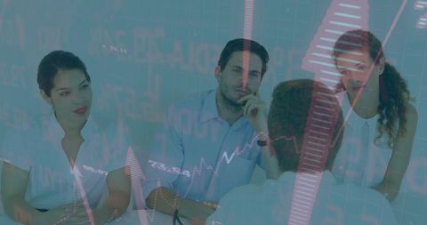 Business team analyzing stock market data in strategic meeting