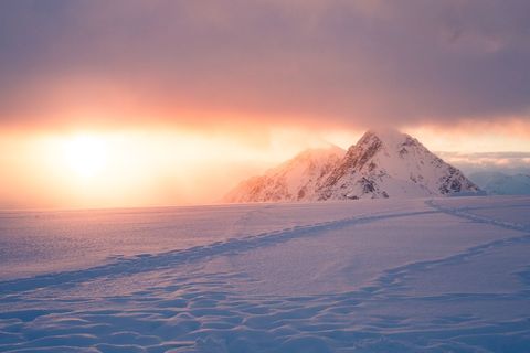 Majestic Snow-Covered Mountains at Sunset