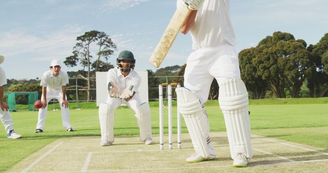 Cricketer Batting on Pitch with Wicketkeeper During Match - Download Free Stock Images Pikwizard.com