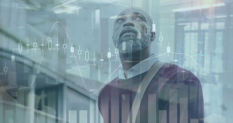 African American Man Analyzing Financial Data in Urban Setting