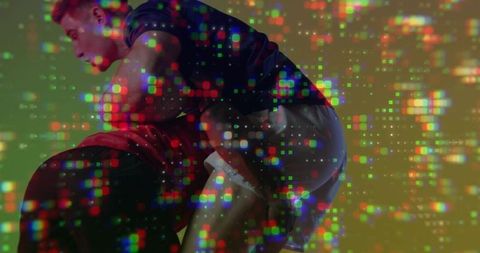 Grappling men controlling torso and hips with colorful digital glitch overlay