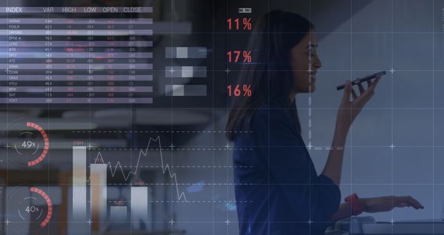 Businesswoman Analyzing Financial Data with Technology Interface - Download Free Stock Images Pikwizard.com