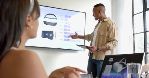 Innovative Business Meeting with VR Headset Presentation