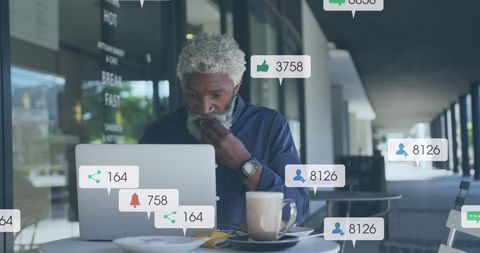 Businessman Analyzing Social Media Engagement Metrics in Modern Workspace - Download Free Stock Images Pikwizard.com