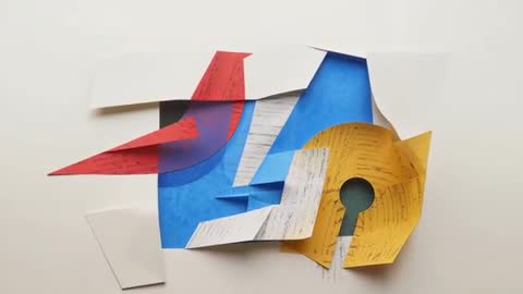 Abstract Lifting and Folding Paper Sculpture in Studio