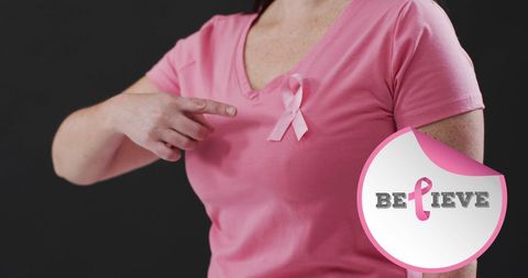 Breast Cancer Awareness Woman in Pink Shirt with Ribbon and Believe Message