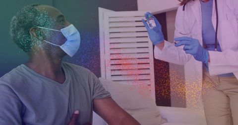 Clinician preparing vaccine syringe while masked patient receiving in-home care