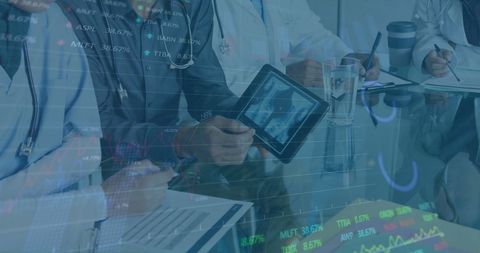Diverse team of doctors analyzing digital data