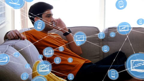 Man on Smartphone Amid Networking Technology Visuals