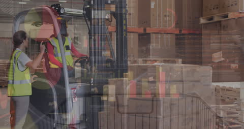 Warehouse Workers Analyzing Logistics with Overlay Graphics