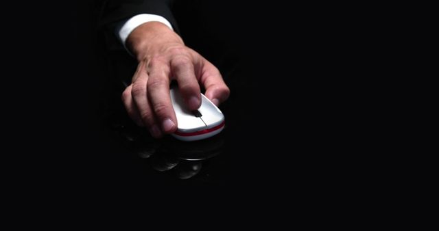 Businessman Using Mouse on Dark Surface for Work - Download Free Stock Images Pikwizard.com