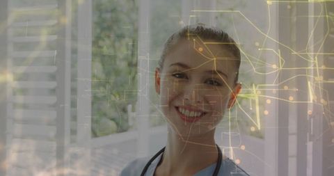 Smiling female nurse with technological network overlay