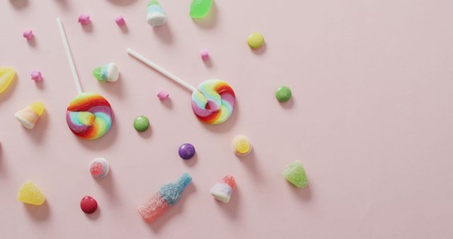 Colorful Assorted Candy Spread on Pink Background - Download Free Stock Images Pikwizard.com