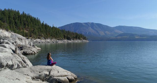 Woman Meditating by Serene Mountain Lake - Download Free Stock Images Pikwizard.com