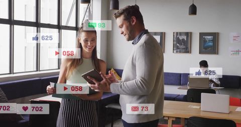 Caucasian Professionals Discussing Social Media Analytics