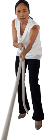 Focused young woman pulling thick rope transparent background