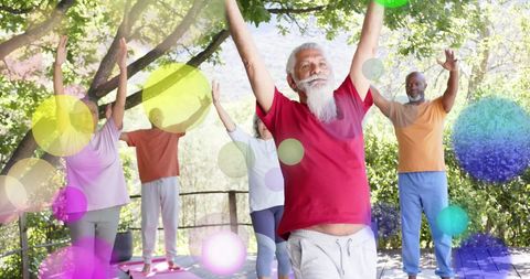 Senior Group Yoga in Garden with Colorful Light Effects