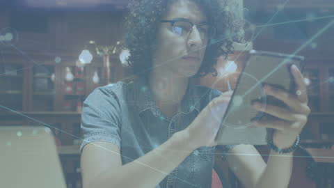 Young Man Engaged in Digital Networking with Tablet