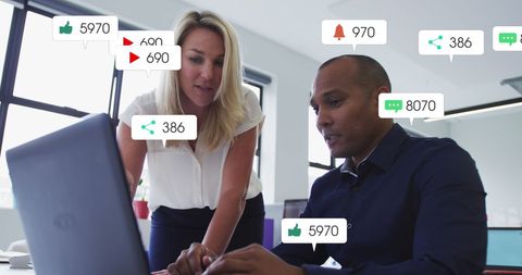 Collaborative Business Team Analyzing Social Media Data in Office