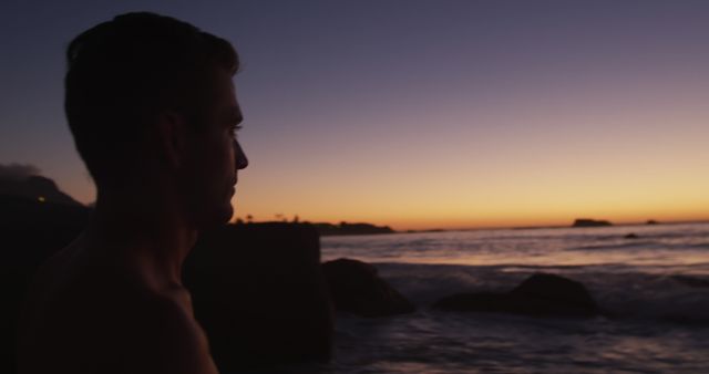 Man Watching Serene Beach Sunset - Download Free Stock Images Pikwizard.com