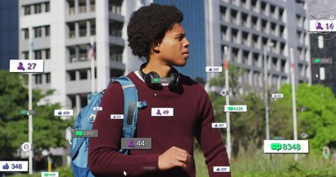young man surrounded by social media interaction numbers - Download Free Stock Images Pikwizard.com
