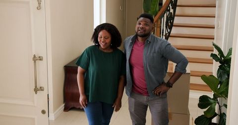 Happy Couple Moving Into New Home Met with Excitement and Anticipation