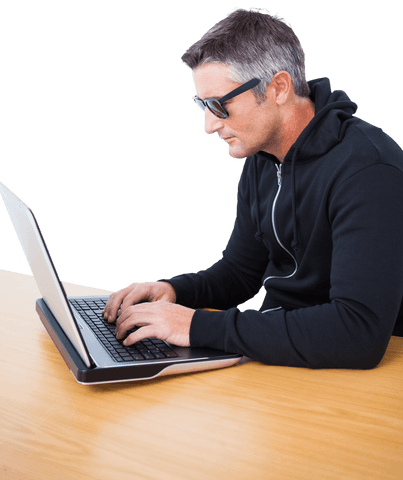 Transparent Businessman Typing on Laptop at Wooden Desk - Download Free Stock Videos Pikwizard.com