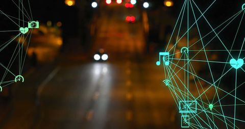 Digital Icons Network Over Urban Night Traffic
