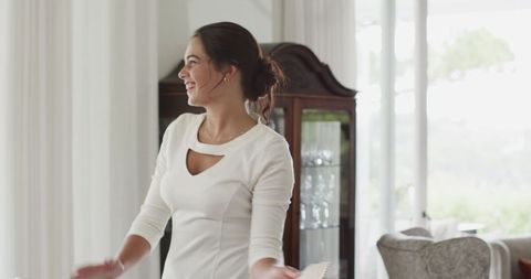 Event planner setting elegant wedding table