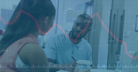 Business Professionals Analyzing Market Trends with Digital Graph Overlay