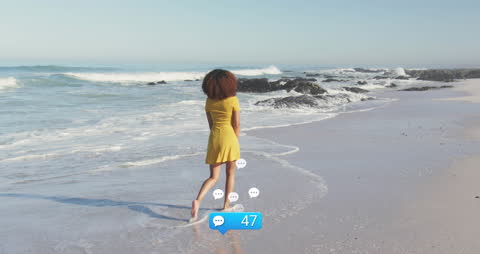 Solitary Woman Enjoying Serene Beach with Social Media Notifications