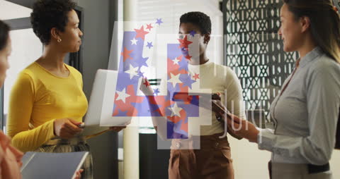 Diverse Businesswomen Collaborating with Digital Devices