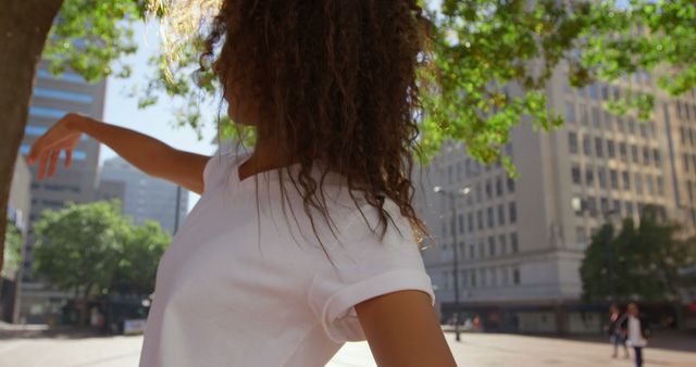 Woman Dancing Elegantly Outside in Urban City - Download Free Stock Images Pikwizard.com