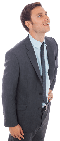 Cheerful Businessman Standing with Hand on Hip, Smiling Looking Up