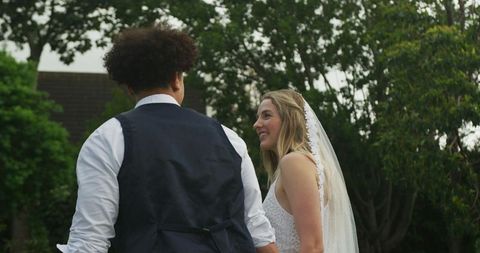 Happy Couple Celebrating Destination Wedding Outdoors
