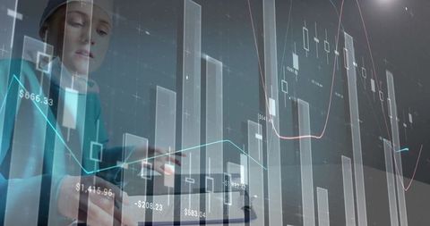 Woman analyzing financial data on laptop with translucent charts overlay