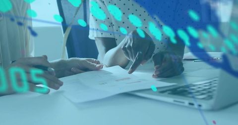 Business Professionals Analyzing Data Reports with Technology Overlay