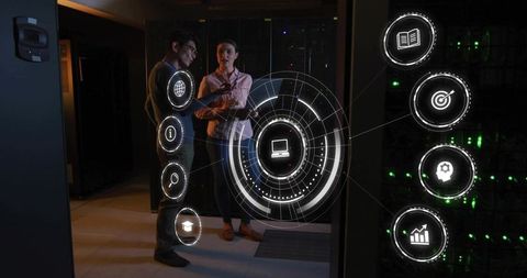 It professionals discussing server monitoring with holographic interface in data center