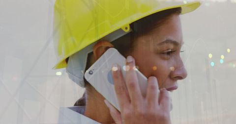 Female architect discussing modern data concepts on smartphone