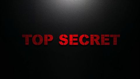 Top secret red woodgrain typography on dark textured backdrop with dramatic spotlight