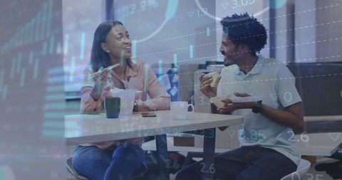 Diverse Coworkers Strategizing Stock Market Lunch Break