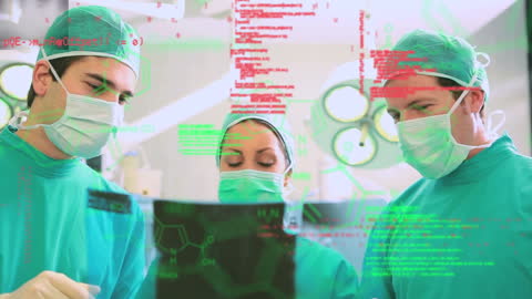 Surgeons Analyzing Medical Data with Digital Overlay in Operating Theatre