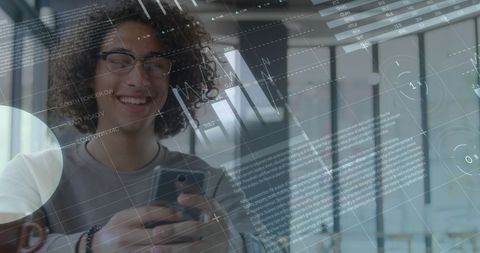 Man Engaging with Smartphone and Digital Analytics Overlay - Download Free Stock Images Pikwizard.com