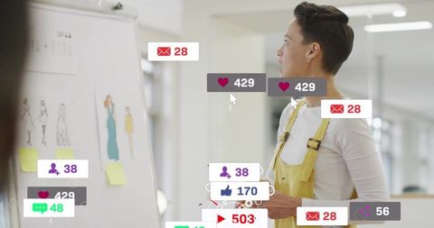 Woman in Yellow Overalls Presenting Fashion Sketches with Social Media Engagement Overlays