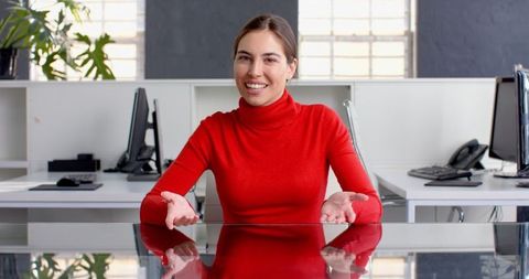 Confident Businesswoman in Red Sweater in Modern Office - Download Free Stock Images Pikwizard.com