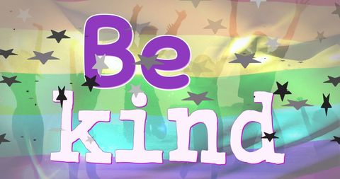 Be kind message over rainbow flag celebrating lgbtq pride