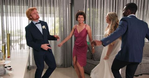 Diverse Friends Celebrating Indoor Wedding Reception