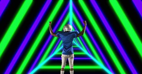 American Football Player Celebrating with Vibrant Neon Lights