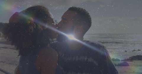 Romantic Couple Kissing on Beach Walkway with Scenic Ocean View