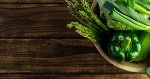 Farm Fresh Vegetable Delight in Rustic Bowl on Wooden Table - Download Free Stock Images Pikwizard.com